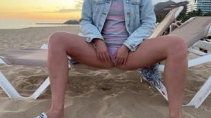 Girl Pissing on the Beach in Public through Panties