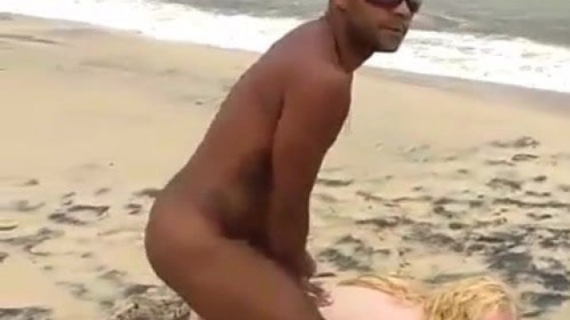 guy fucking two chicks beach