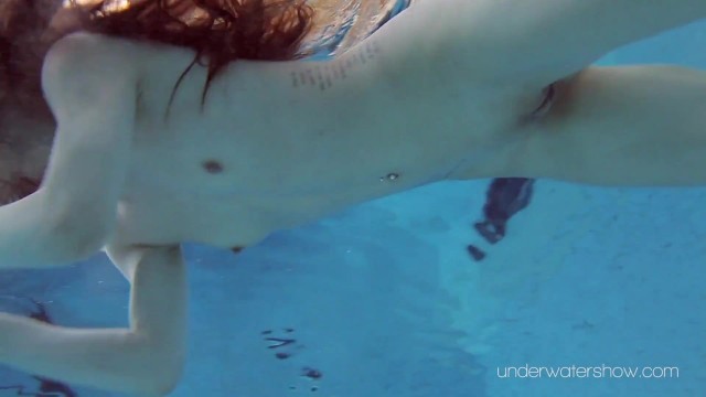 Roxalana Cheh sexy redhead underwater